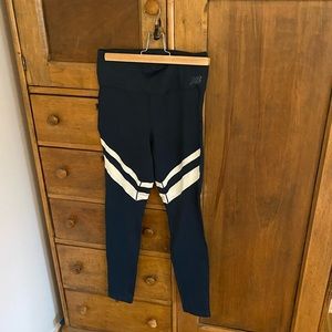 New Balance Dry running tights with vintage stripes